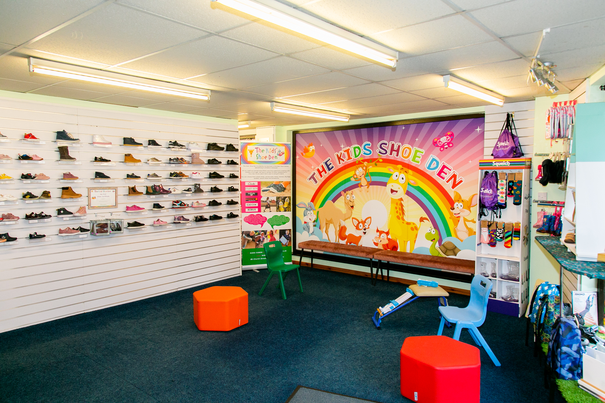 Kids Shoe Den - in store with back wall